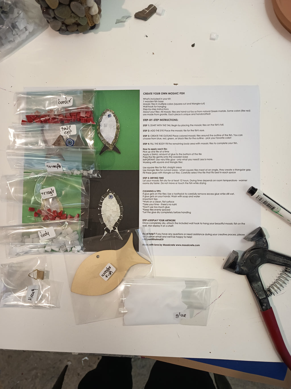 Complete DIY mosaic fish kit showing finished product, wooden fish base, hand-cut tiles and materials