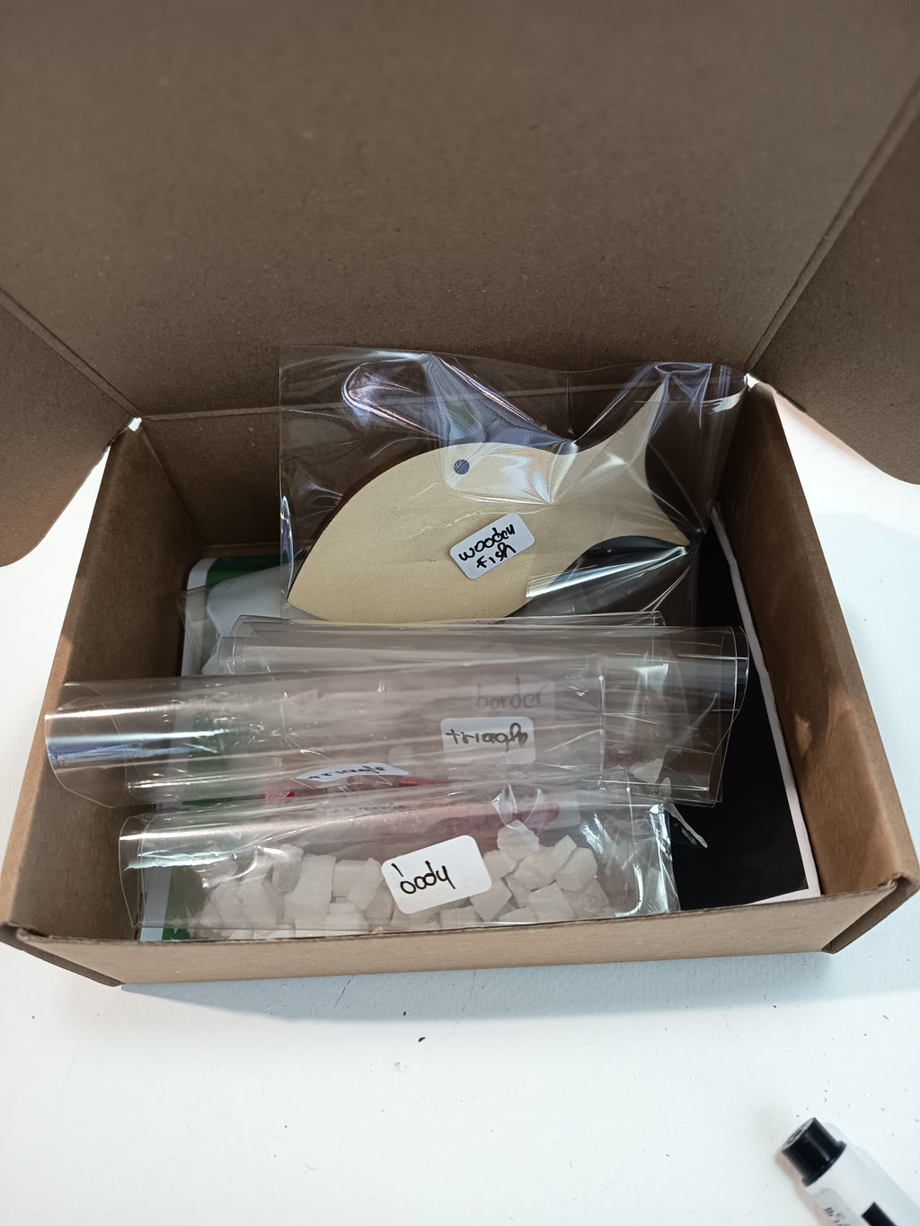 DIY mosaic fish kit packaging - wooden base and hand-cut marble tiles in gift box