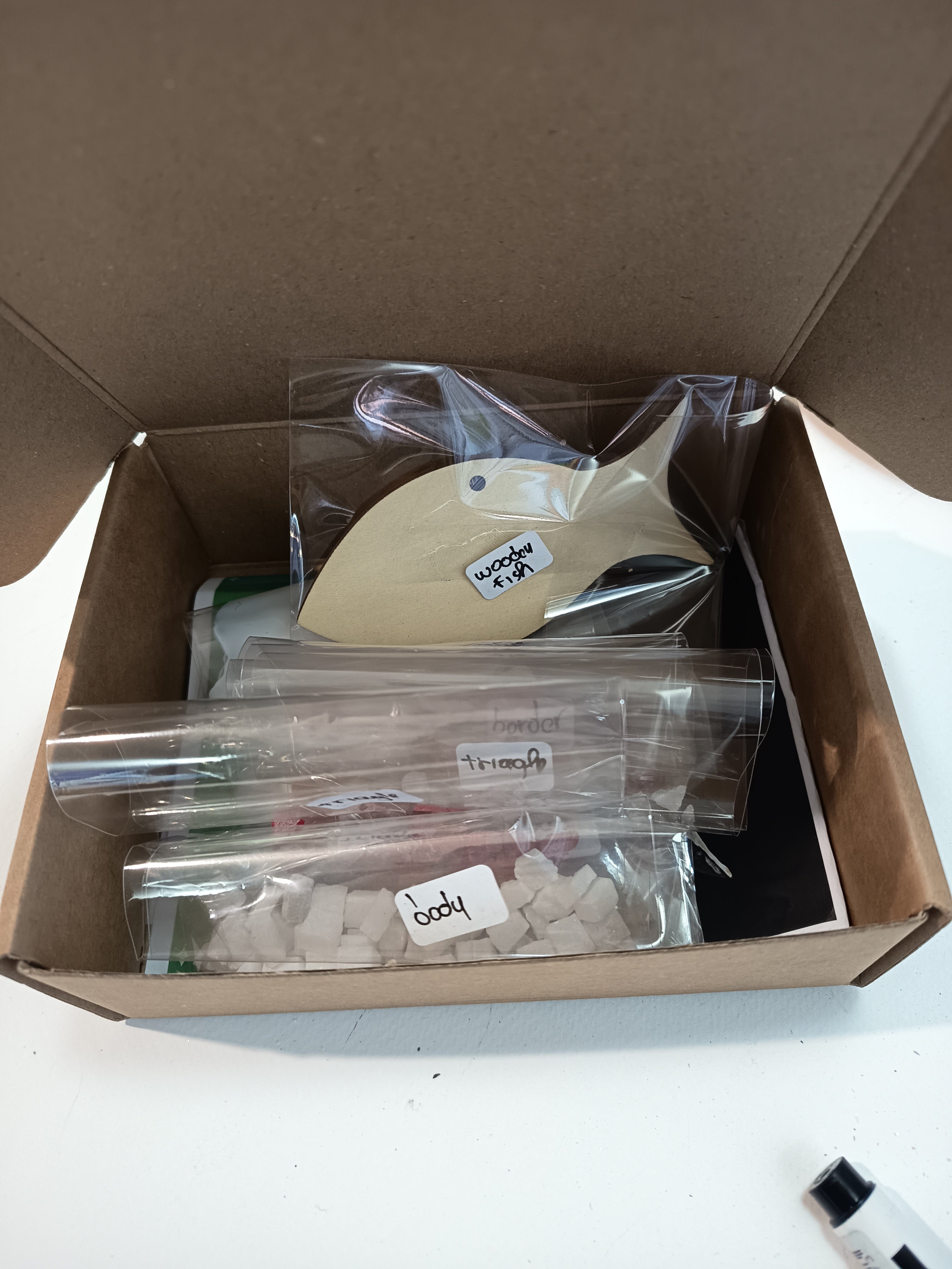DIY mosaic fish kit packaging - wooden base and hand-cut marble tiles in gift box