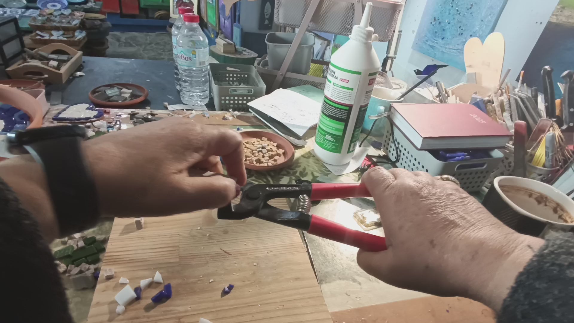 Behind the scenes - hand-cutting marble tiles in our workshop to create authentic handmade mosaic pieces for your DIY cross kit